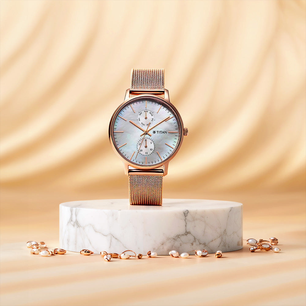 Titan mother of pearl dial analog watch discount