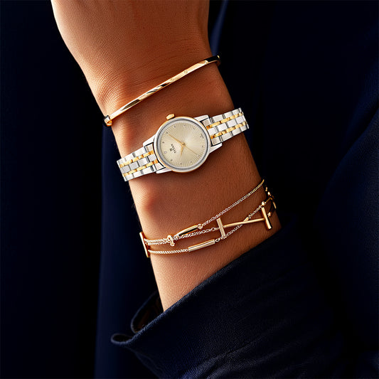 Đồng hồ Nữ TITAN dây kim loại Titan Karishma Champagne Dial Analog Watch for Women mặt màu Vàng Kim 25 mm - 2593BM01